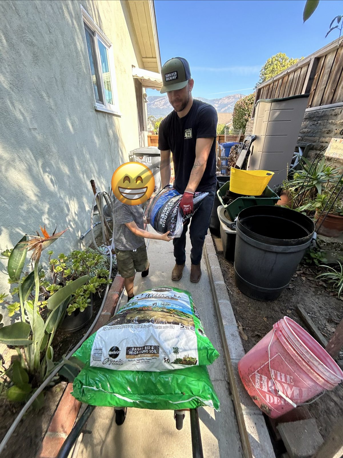 Jack delivering garden supplies to a customer's family in Santa Barbara